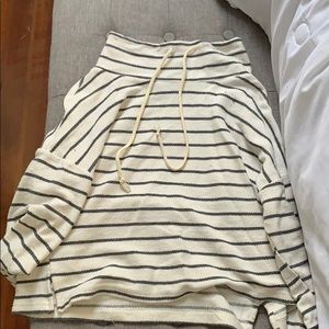 Woman’s turtle neck light sweater